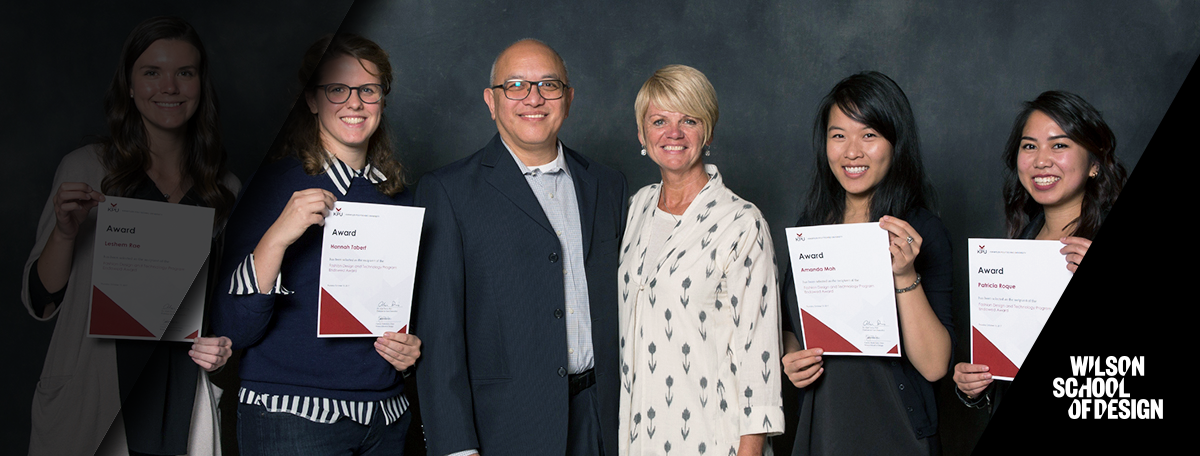 Wilson School of Design Students holding up scholarship papers.